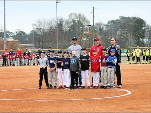 Teams lined up across the infield during Toccoa Little League opening ceremonies